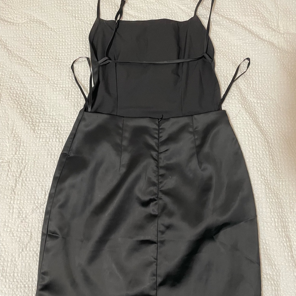 Aritizia Dress Cut out in the back in Black size Small